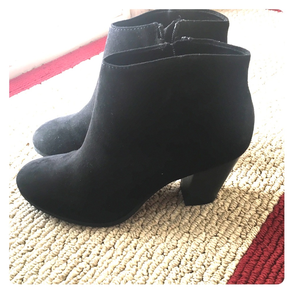 Never worn, black booties. 9.5